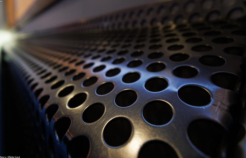 HVAC technician servicing equipment